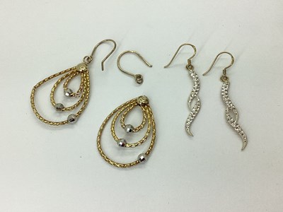 Lot 63 - A Pair of Twist Style Inset Drop Earrings, to...