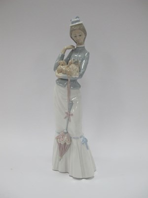 Lot 1142 - Lladro Figurine 'Walk with The Dog', 36cm high.