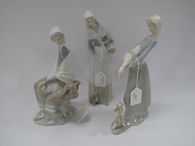 Lot 1224 - Lladro Figurines - Lady holding goose with...