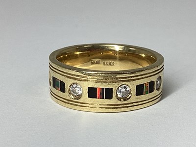 Lot 187 - A Modern Wide Diamond Set Band Ring, rubover...