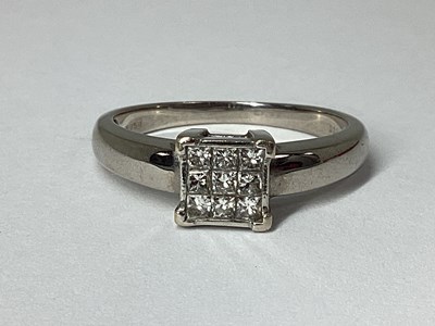 Lot 206 - A Modern Princess Cut Diamond Set Ring, nine...