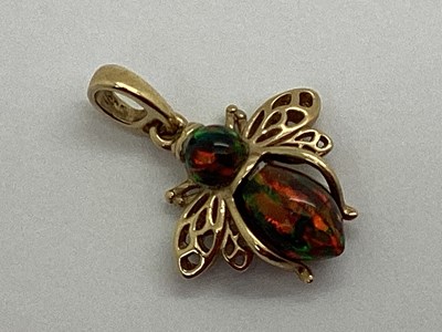 Lot 90 - A Modern 9ct Gold Black Opal Bee Pendant, with...