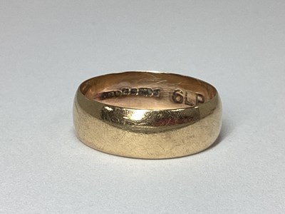 Lot 190 - A 9ct Gold Wide Plain Wedding Band, (finger...
