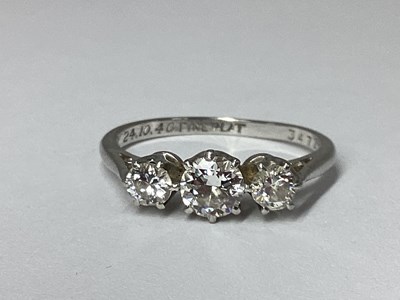 Lot 210 - A Vintage Three Stone Diamond Ring, claw set...