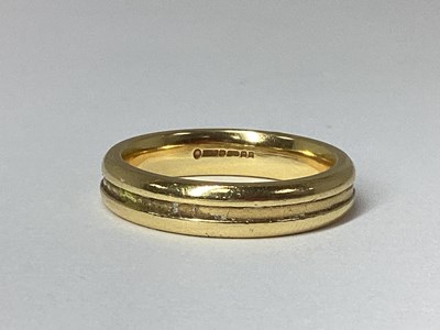 Lot 11 - An 18ct Gold Wedding Band (finger size N).