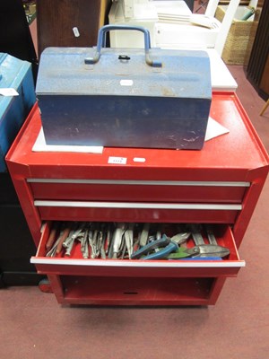 Lot 1173 - A red metal rolling tool chest with three...