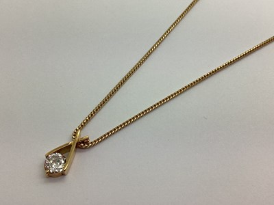 Lot 114 - A Modern Single Stone Diamond Pendant, the old...