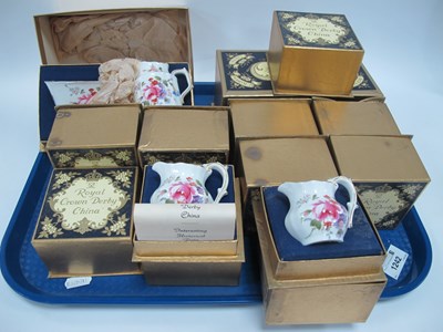 Lot 1242 - Royal Crown Derby Posies Sugar and Cream sets...