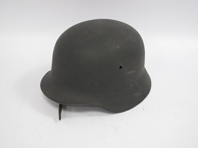 Lot 514 - WWII German M40 Helmet, stamped to inner brim,...
