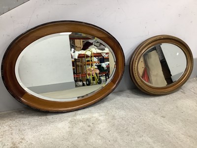 Lot 1473 - Two Oval Fraimed Bevelled Wall Mirrors circa...