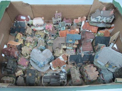 Lot 1005 - Quantity of cottage models, in various...
