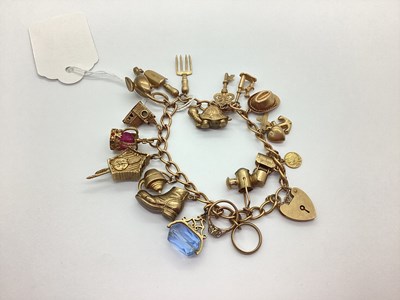 Lot 49 - A 9ct Gold Curb Link Bracelet, suspending...