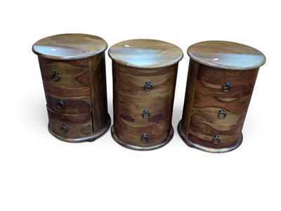 Lot 1507 - Three Hardwood Three-Drawer Chests of Circular...