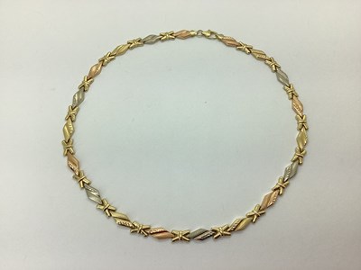 Lot 70 - A Decorative Three Colour Necklace, of shaped...