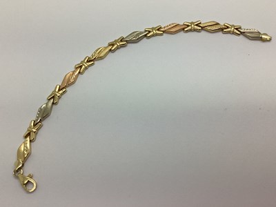 Lot 157 - A Decorative Three Colour Bracelet, of shaped...