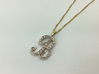 Lot 74 - A 9ct Gold Initial 'B' Pendant, scroll design...
