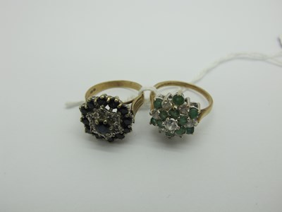 Lot 320 - A 9ct Gold Cluster Ring, claw set throughout,...