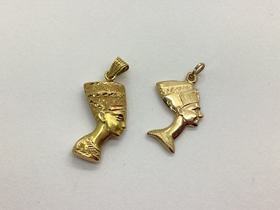 Lot 92 - An Egyptian Nefertiti Pendant, satin and...