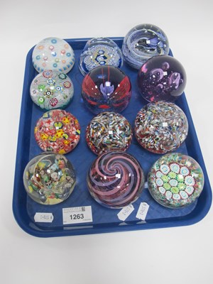 Lot 1263 - Twelve art glass paperweights, in various...