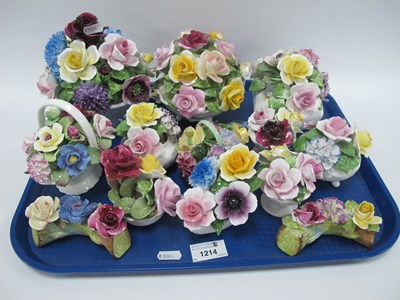 Lot 1214 - Thirteen fine bone china floral ornaments,...