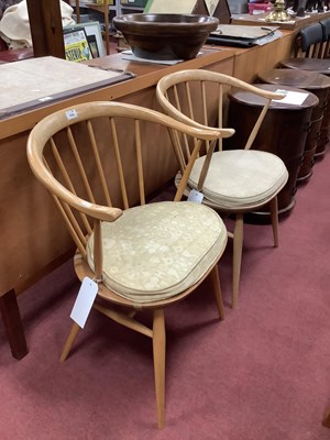 Lot 1508 - Ercol, pair of lightwood cowhorn chairs...