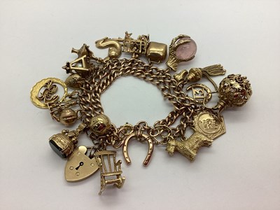 Lot 159 - A Two Row Curb Link Charm Bracelet, (converted...