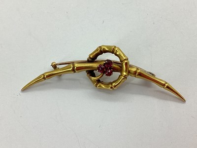 Lot 142 - A Victorian Brooch, of bamboo design with claw...