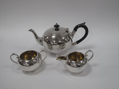 Lot 1303 - Three-piece silver-plated tea service by James...