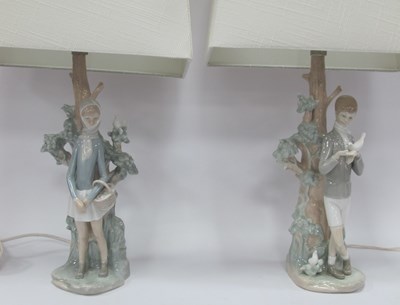 Lot 1224 - Lladro Boy with Dove lamp together with a...