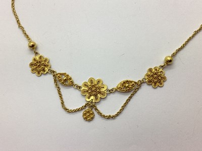 Lot 115 - A Decorative Necklace, of filigree flowerhead...